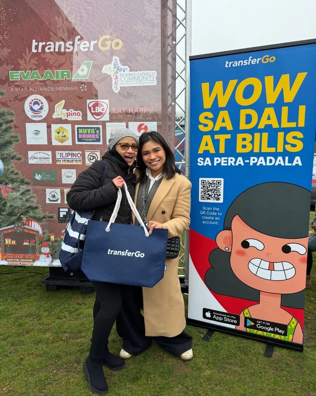 Community member signing up at the TransferGo stall