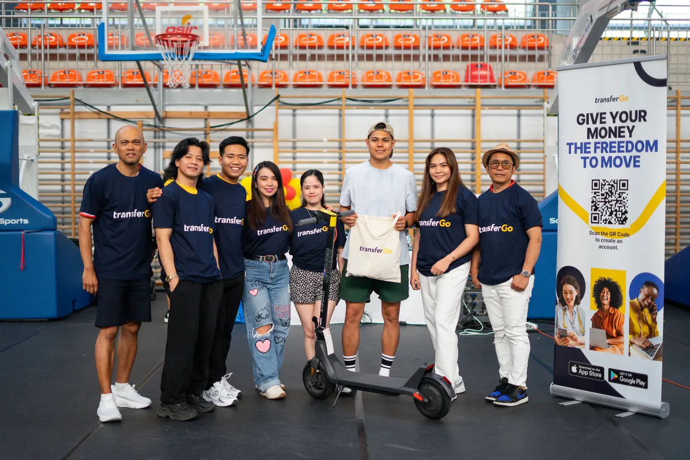 Prize giving with TransferGo branding at the OWWA Cup