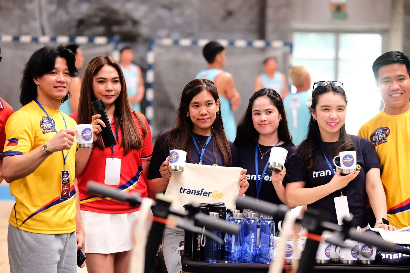 Attendees at the TransferGo activation stand during the OWWA Cup